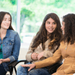 Parents talking in a meeting
